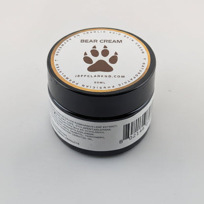 Jar of Bear Cream with a paw print logo on a white background