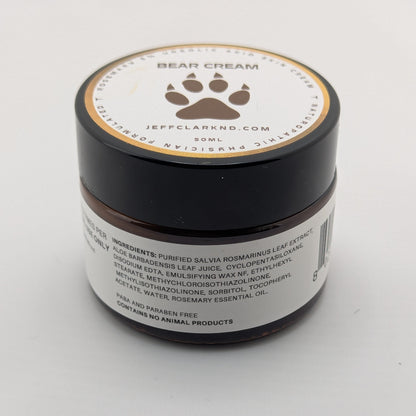 Jar of bear cream with a paw print logo on a white background